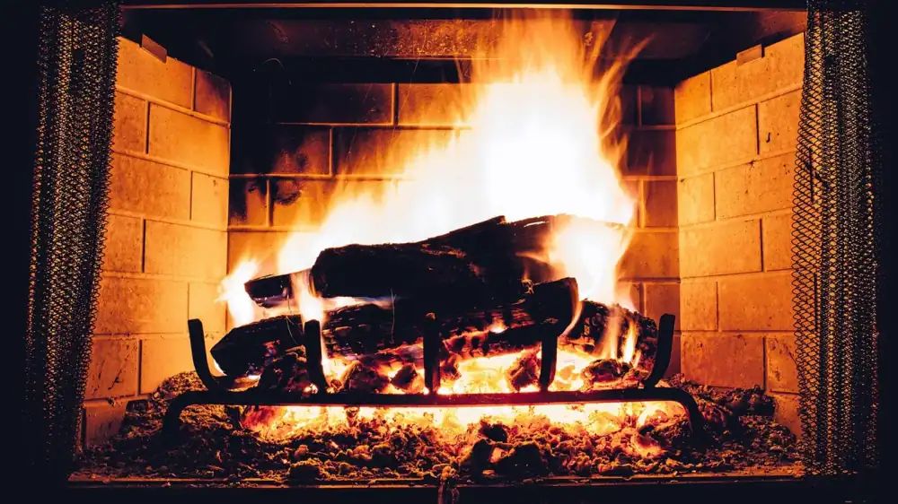 Logs burning in a residential fireplace